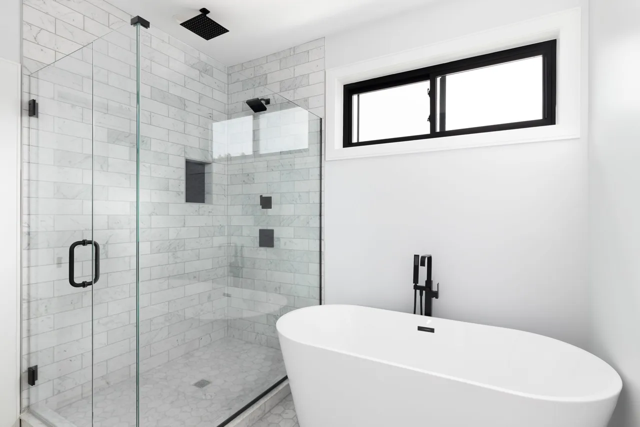 Newly installed bathroom fixtures and shower valve by Allegiant Plumbing in Columbus, Ohio