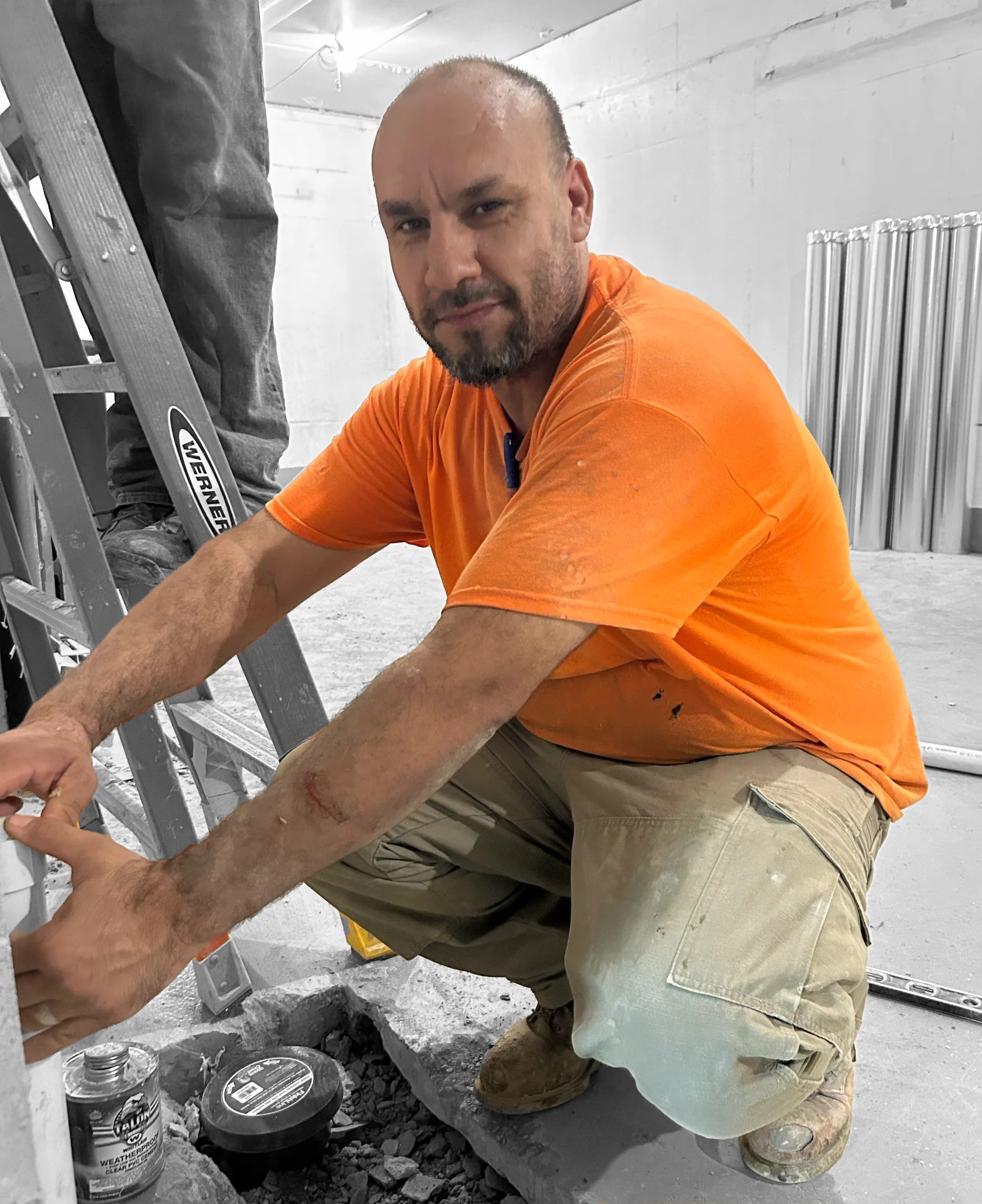 Allegiant Plumbing team members collaborating and training together, showcasing company culture and professional development